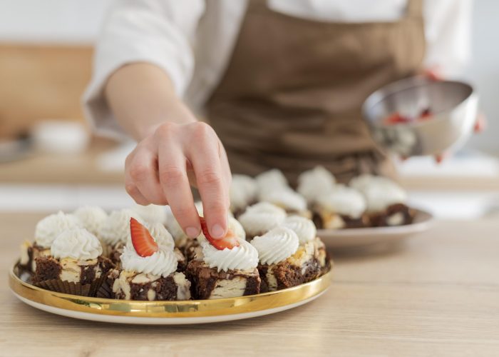 close-up-hand-holding-strawberry